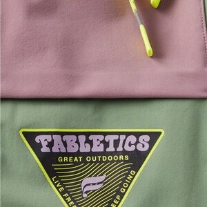 Men’s Fabletics the one jogger in purple, green & black